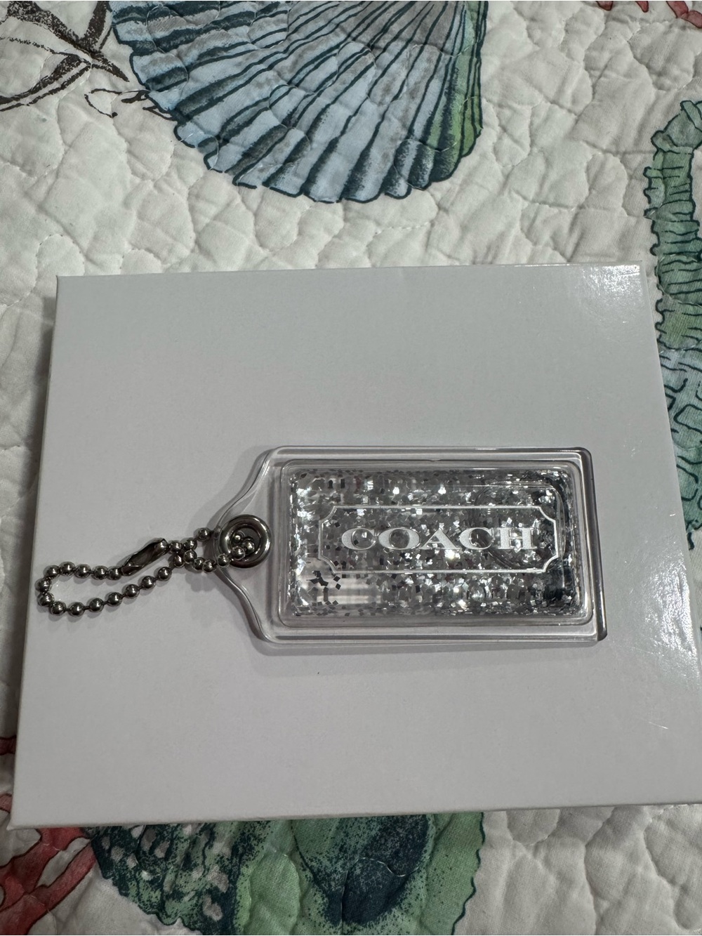 COACH Clear Silver Glitter snow globe bag tag